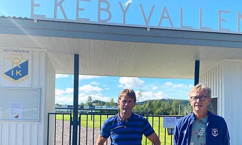 Two men at a fotball arena in Rottneros